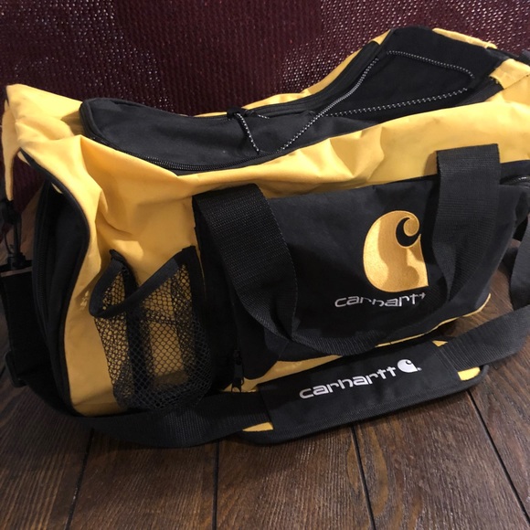 black and yellow duffle bag